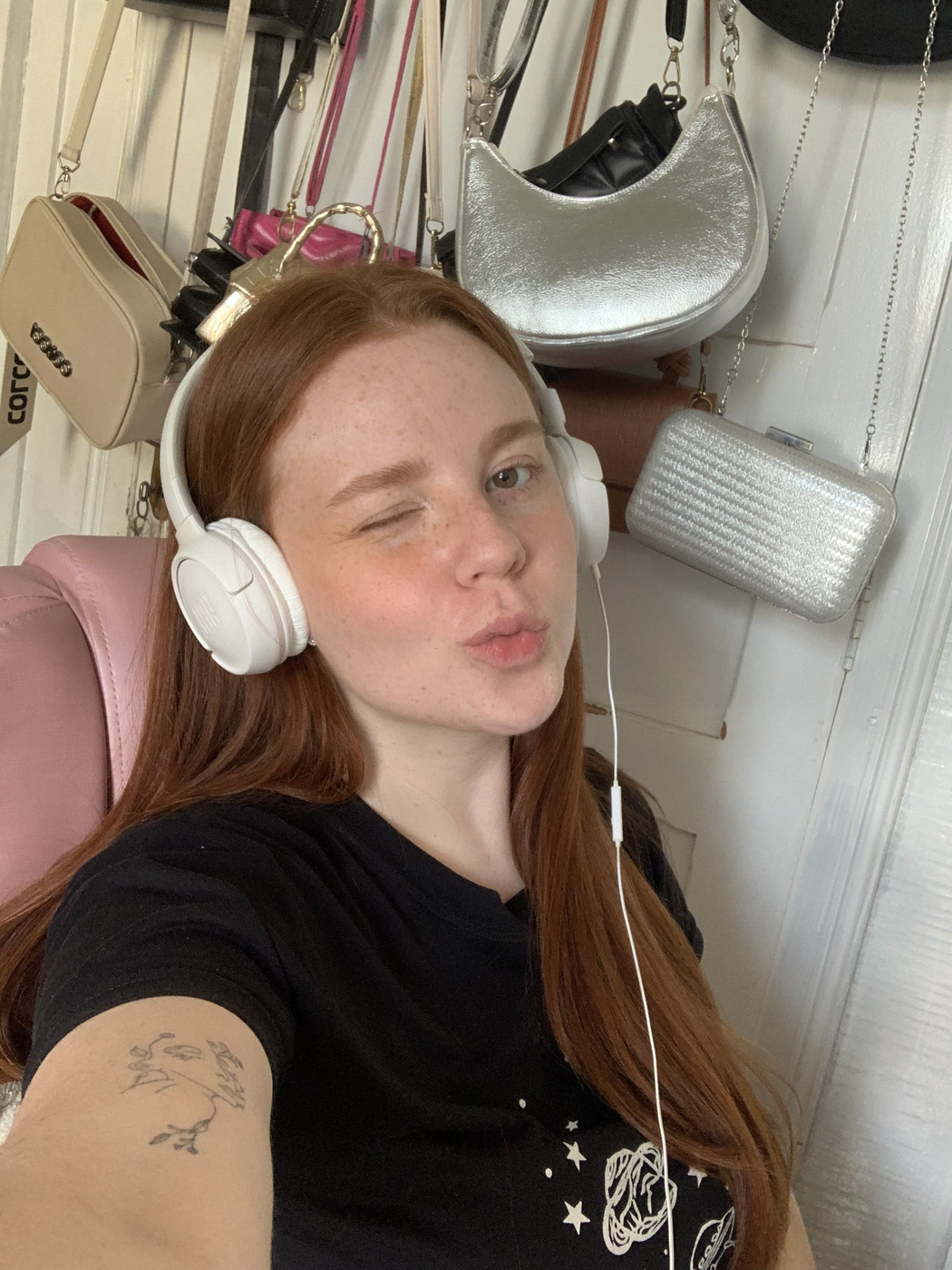 Designer working with headphones on